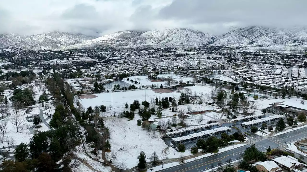 Southern California gets hit with powerful storm bringing rain, mountain snow, gusty winds