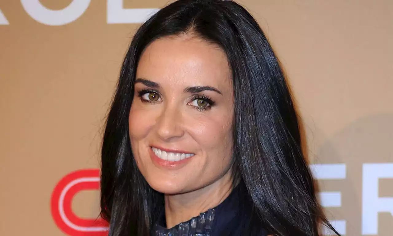 Demi Moore, 60, wows in buttoned-down shirt and high heels for jaw-dropping throwback photo