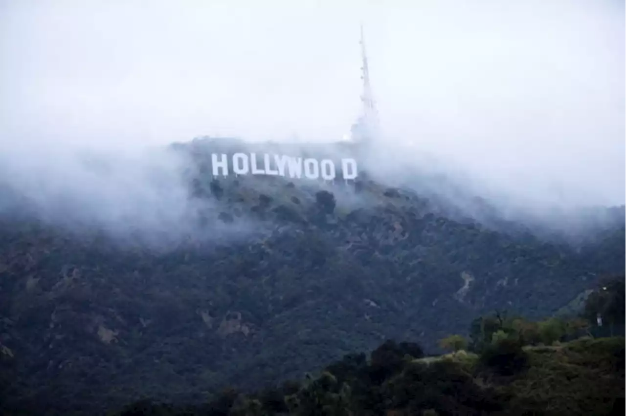 Blizzard warnings extend into Southern California as snowflakes brush Hollywood sign