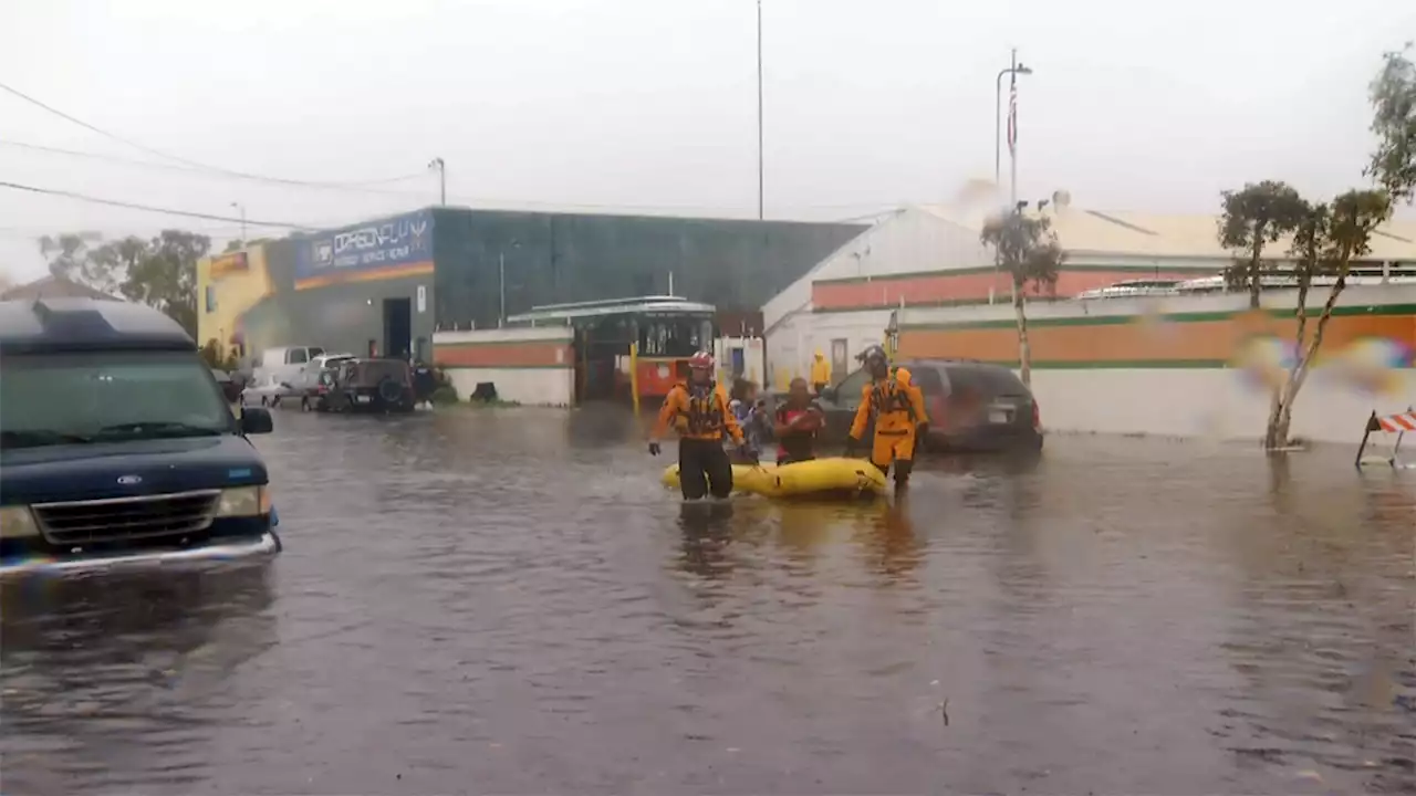 Lifeguards Rescue Two People Trapped in Vehicle Due to Flooding Near San Diego Airport