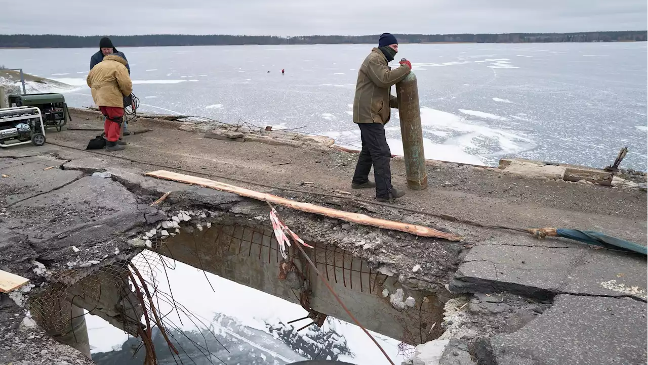 Ukraine’s emergency repair crews race to patch up the damage after Russian air strikes