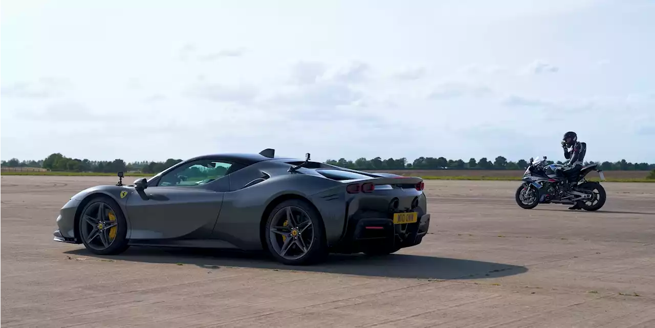 Watch a Ferrari SF90 Take On a BMW Superbike in a Drag Race