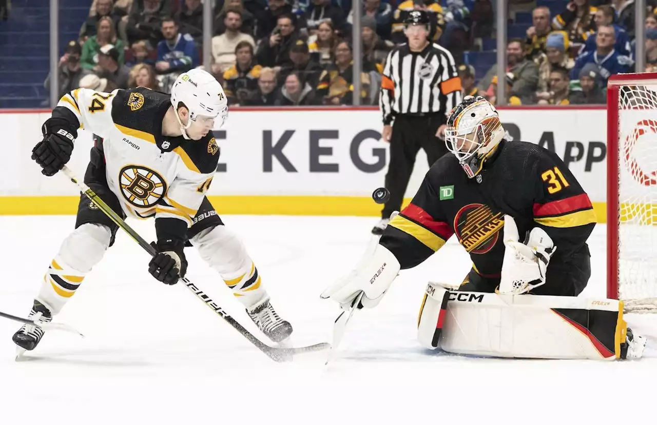 Goalie Ullmark scores as Bruins beat Canucks 3-1