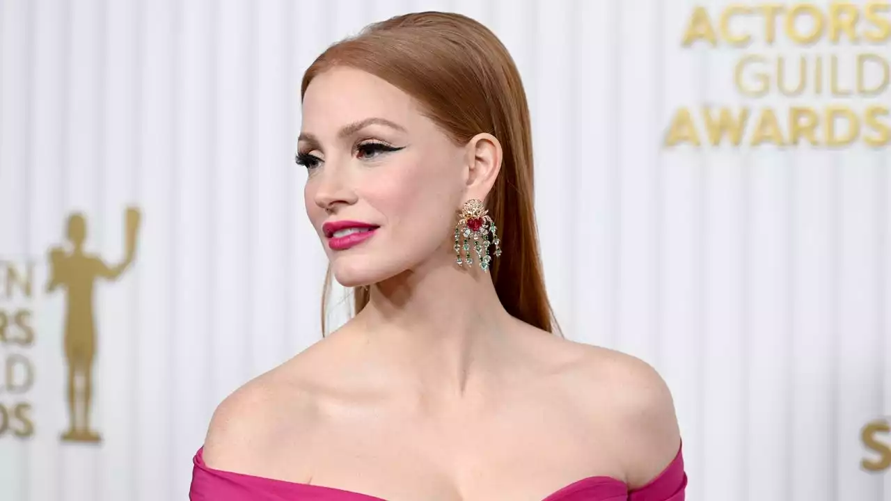 Jessica Chastain Trips Up Stairs While Accepting SAG Award (Exclusive)