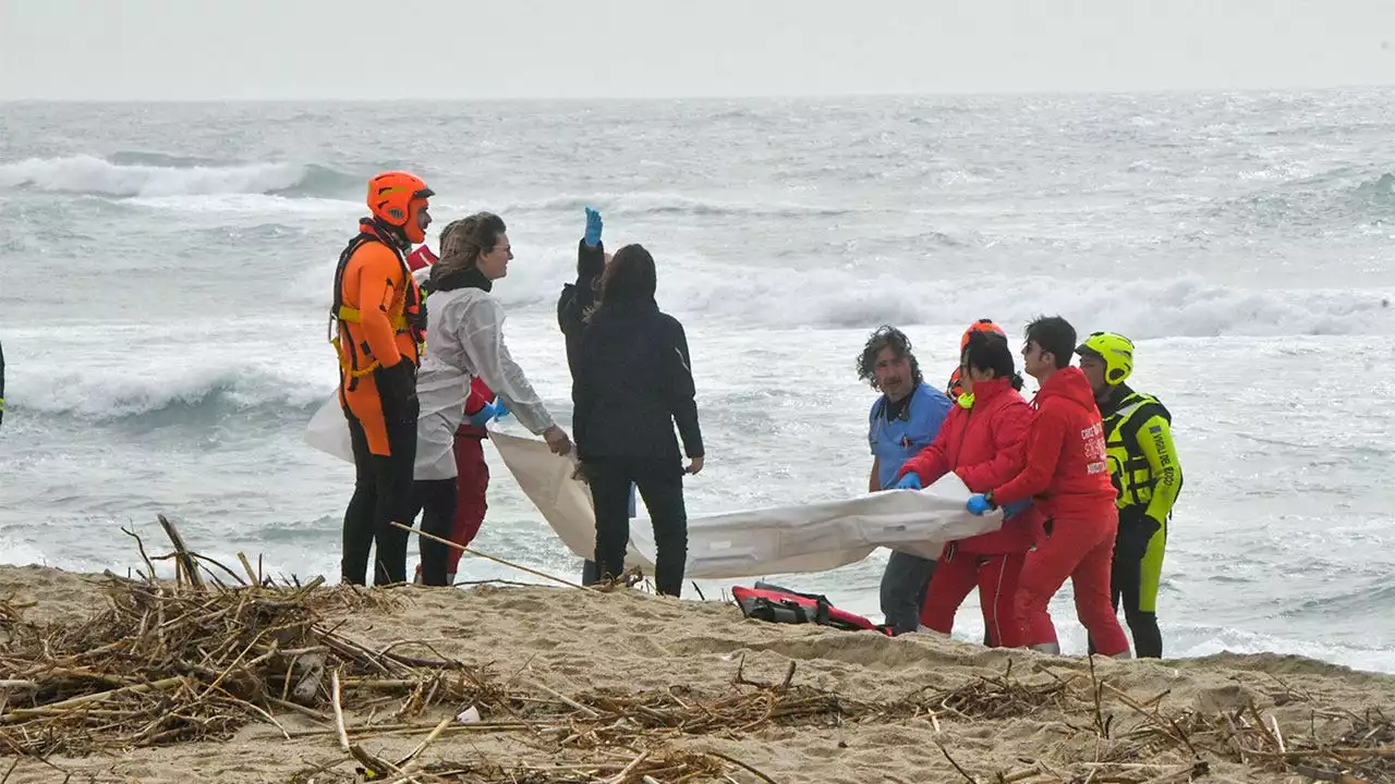 Italy shipwreck: Coast guard says dozens dead after migrant craft crashes off coast