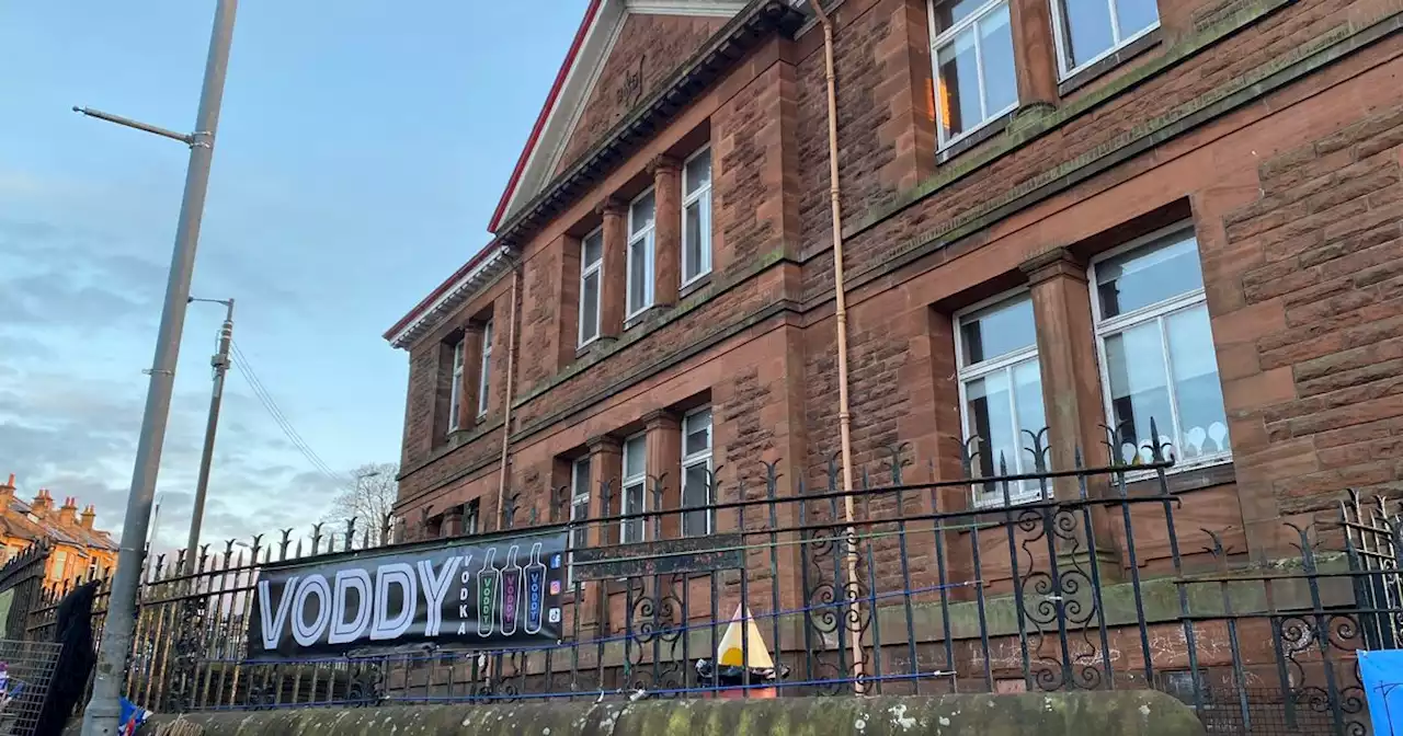 Vodka advert on Glasgow primary school railing sparks outrage