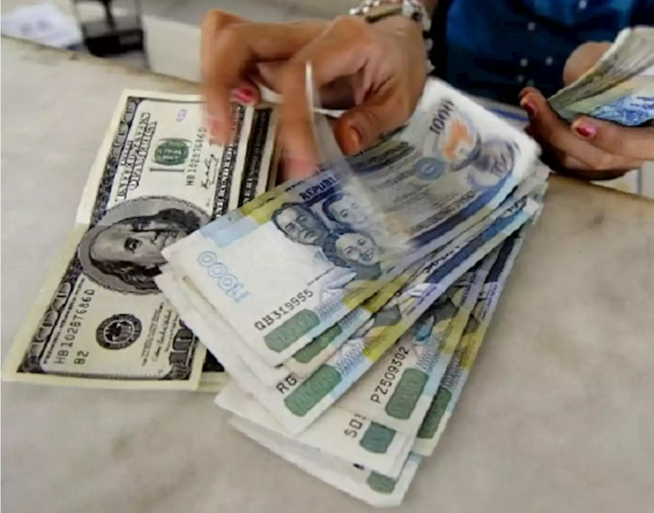 Peso weakens vs dollar, closes at 55.51 to $1