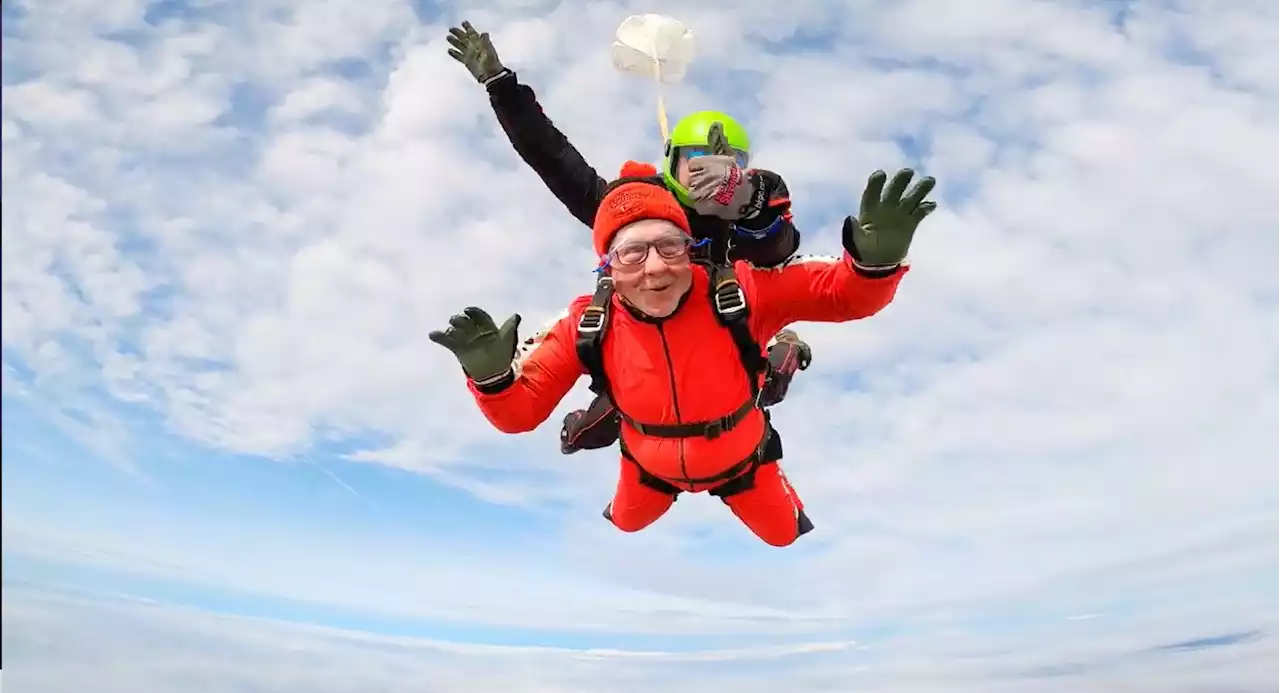 Cancer-stricken man, 76, completes 11,000ft skydive in memory of partner