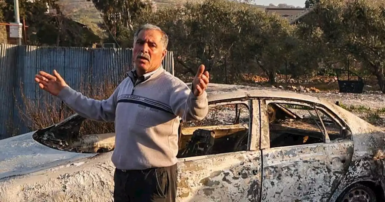 Israeli settlers rampage through a Palestinian town in revenge for shooting