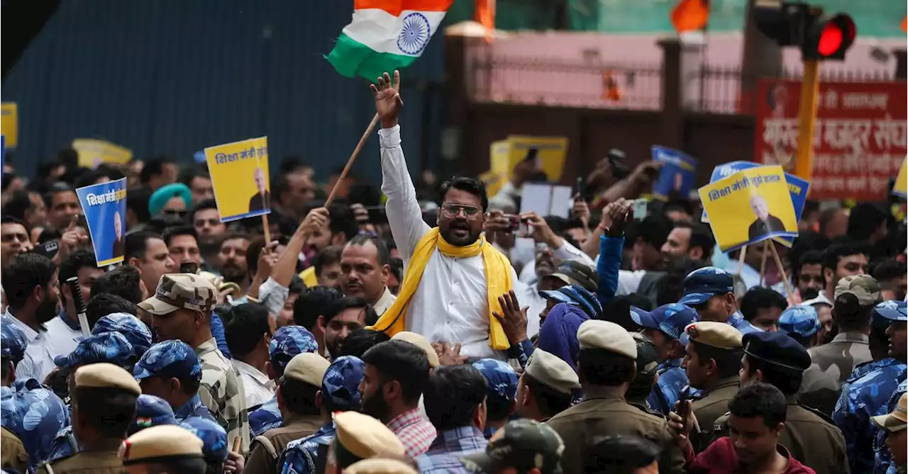 Protests erupt in India after minister's arrest in liquor probe