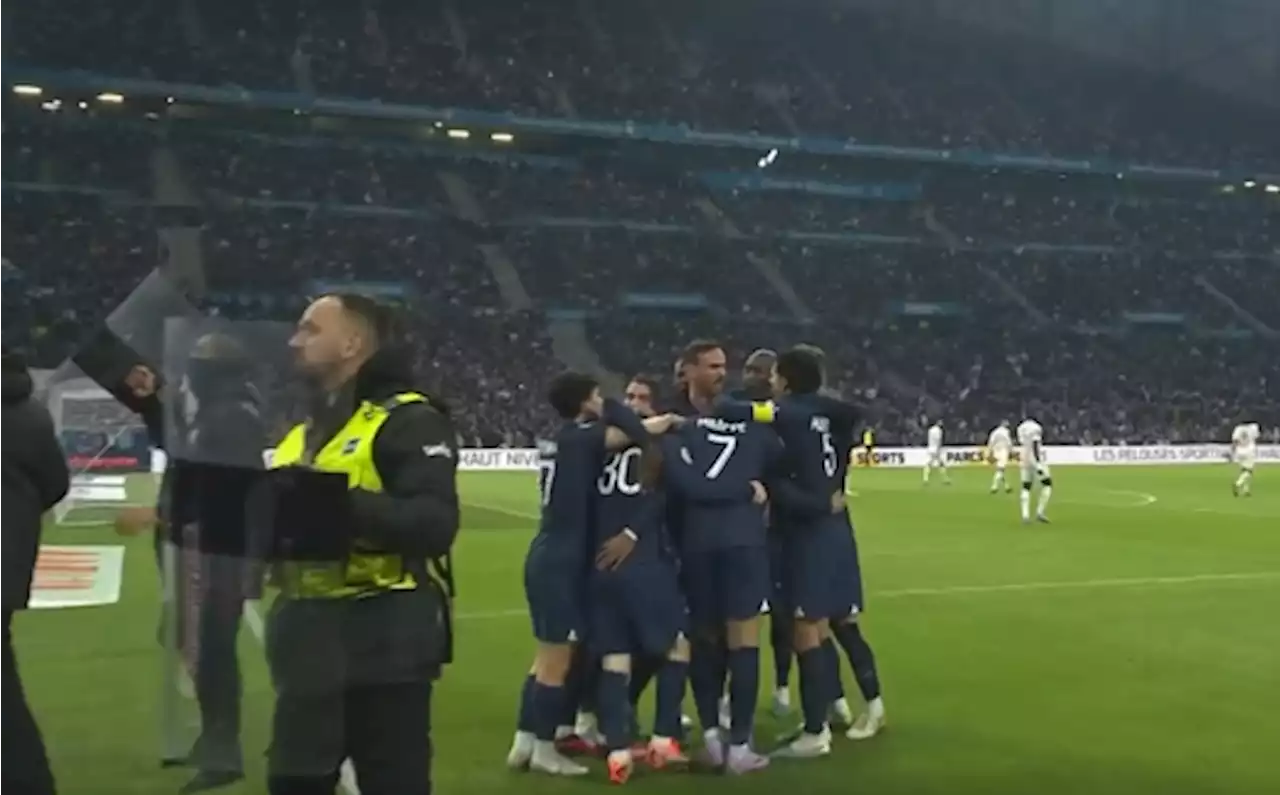 Stewards use riot shields to protect PSG stars when celebrating Messi's landmark goal