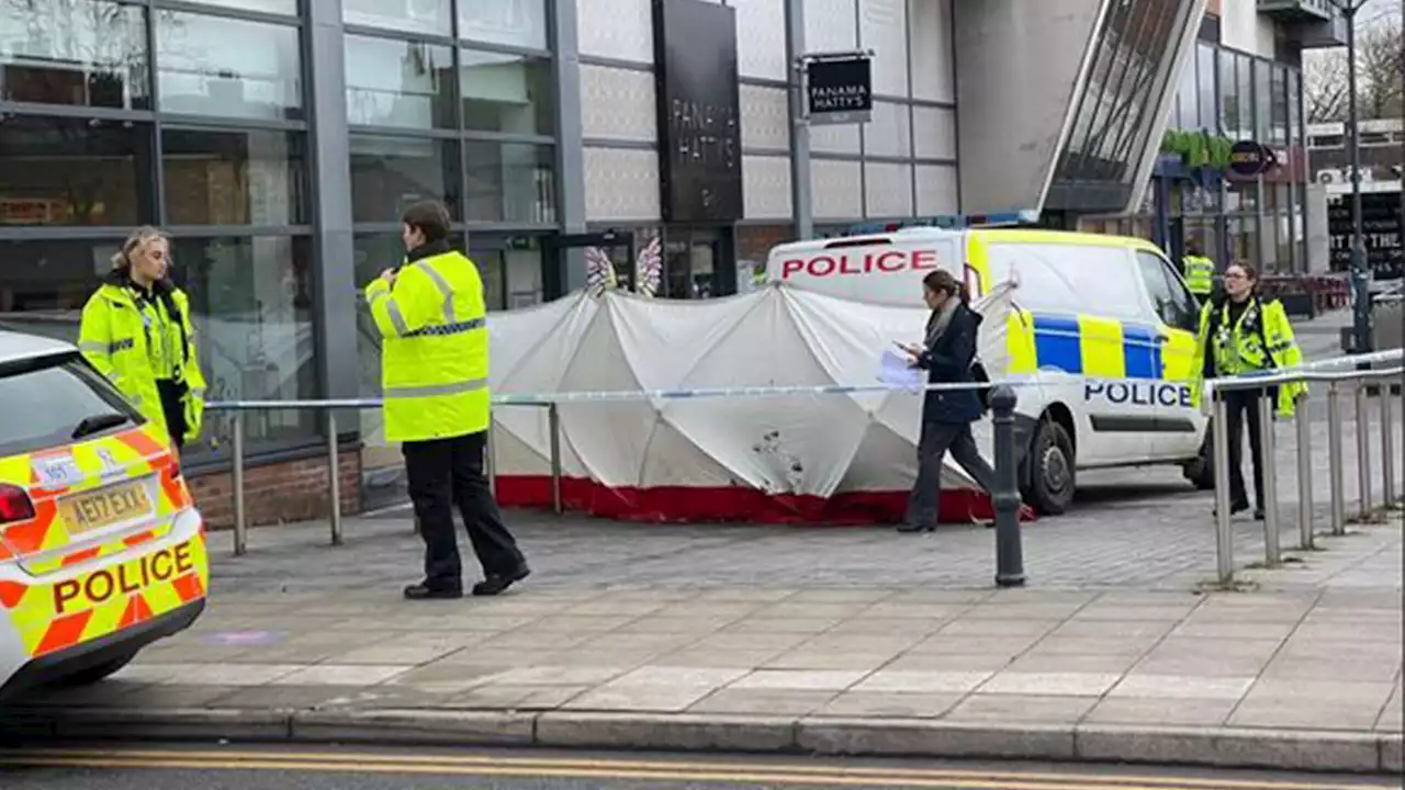 Body is discovered in town centre as police tape off area