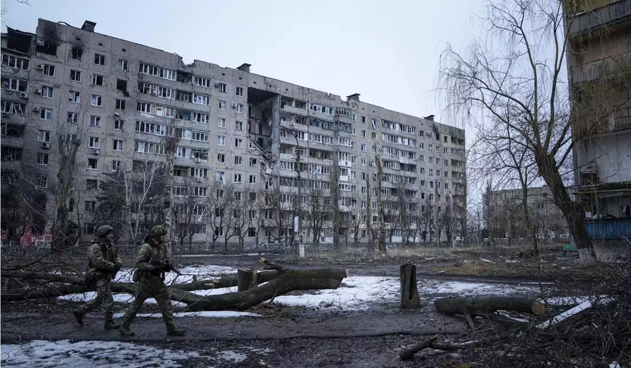 On Ukraine front, civilians cling on as troops repel Russia