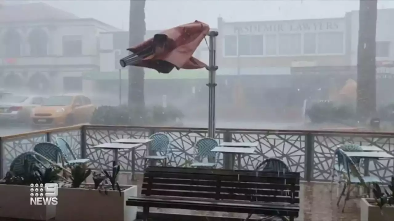 Roof ripped off apartment block as freak storm smashes NSW Mid North Coast