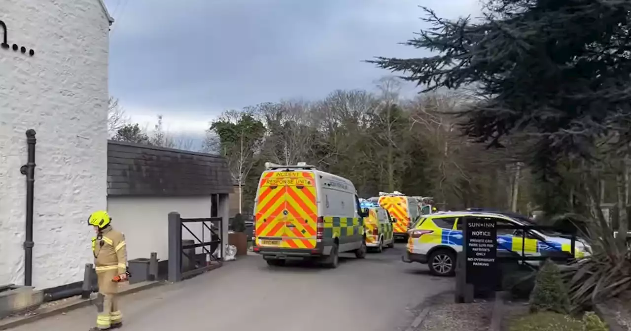 Emergency services rush to Scots river after woman 'slips down bank chasing dog'