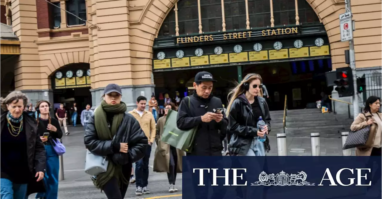 Melbourne shivers through summer cold front, but warm weather is coming