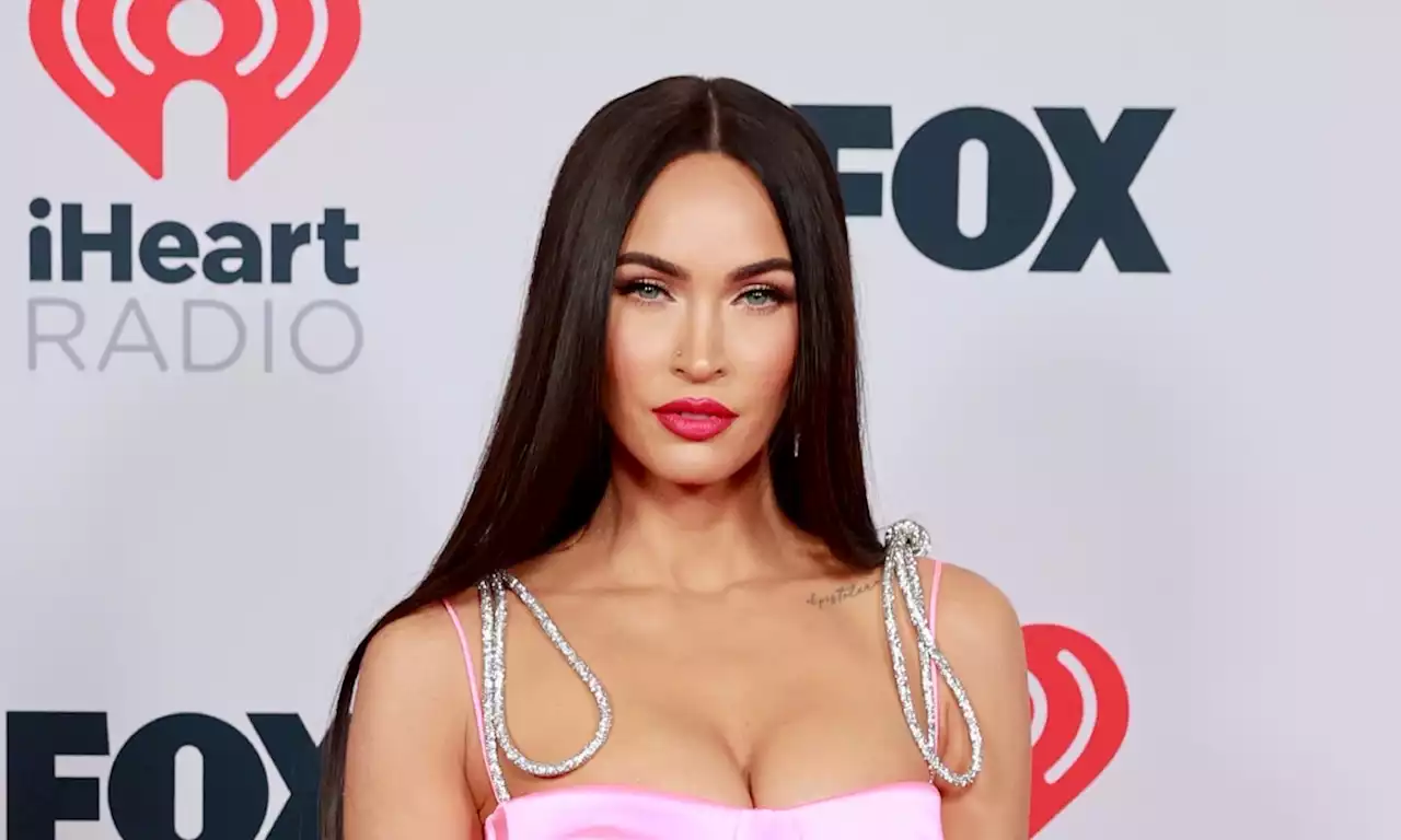 Megan Fox opts for red carpet glamor in red corset gown for pre-Grammys party