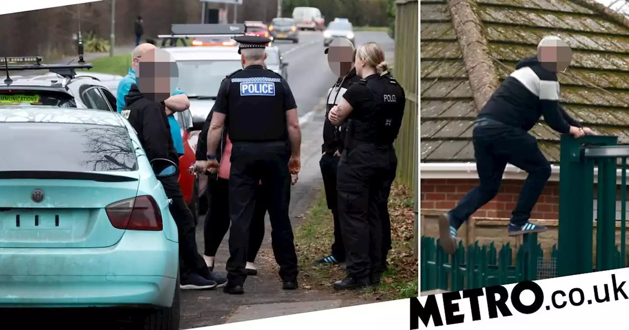 Vigilantes try to scale fence to get to paedophile Gary Glitter at halfway house