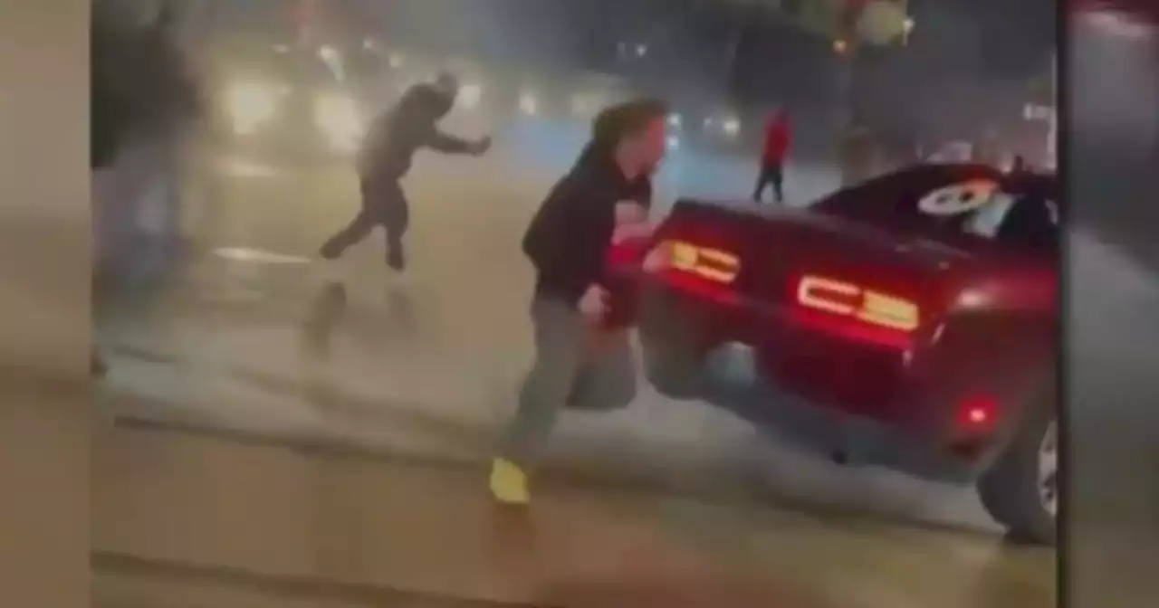 Woman seen being thrown from car, run over in video of latest street takeover