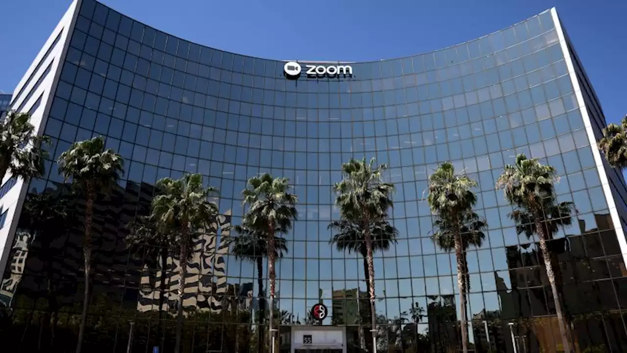 Zoom will lay off 1,300 employees and CEO is taking a massive pay cut | CNN Business