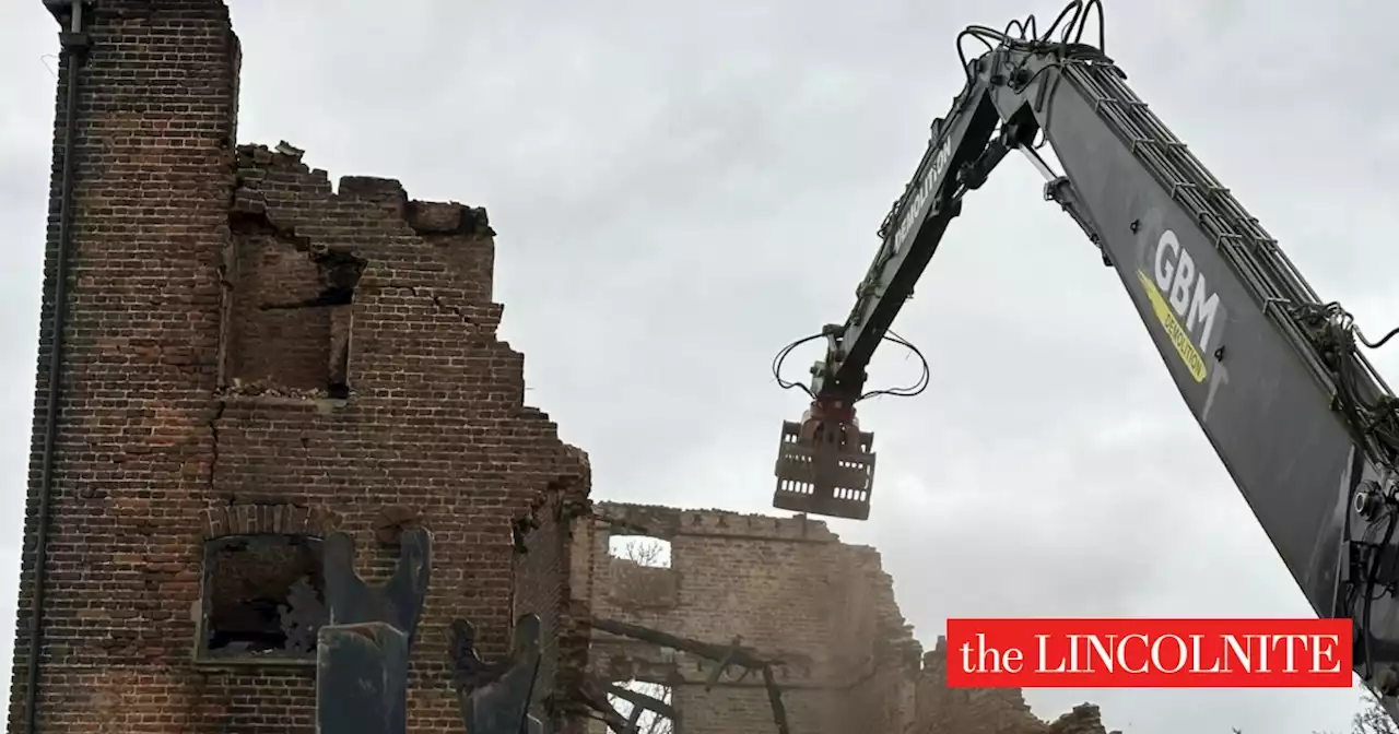 Watch demolition of historic Boston building destroyed by fire