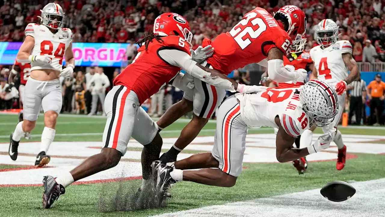 Georgia's Bullard signs photo of Ohio State's Marvin Harrison Jr. hit with 'Night Night'