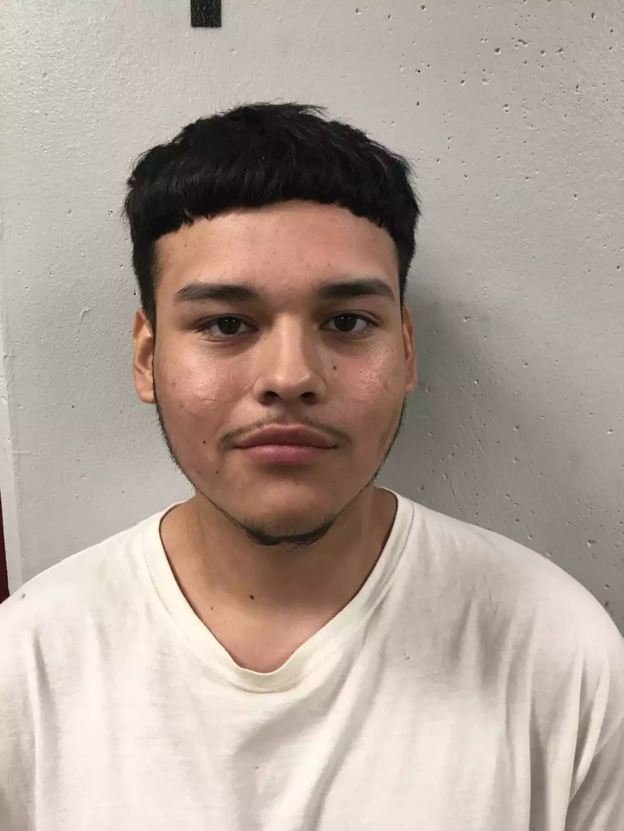 19-year-old man accused of fatal close-range shooting through open car window