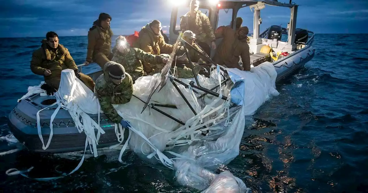 Photos Show US Navy Recovering Chinese Balloon Shot Down Over South Carolina