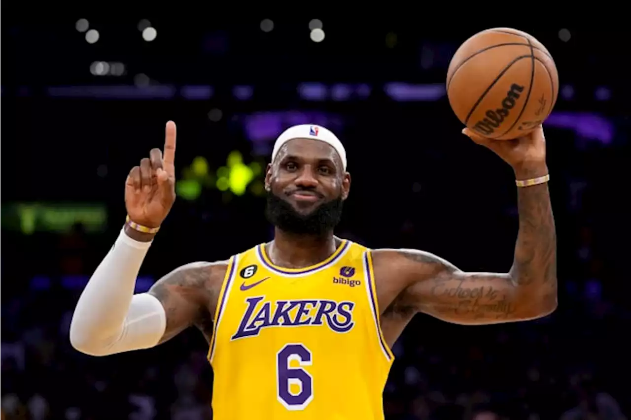 LeBron James makes NBA history on a star-filled night in LA