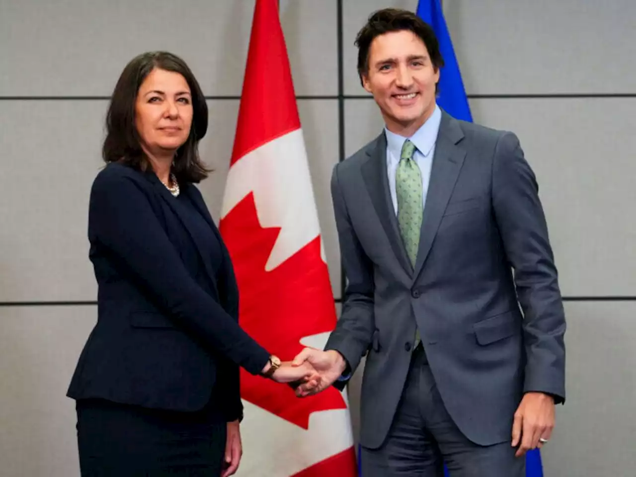 Awkward handshake ensues after Alberta Premier Smith meets Prime Minister Trudeau