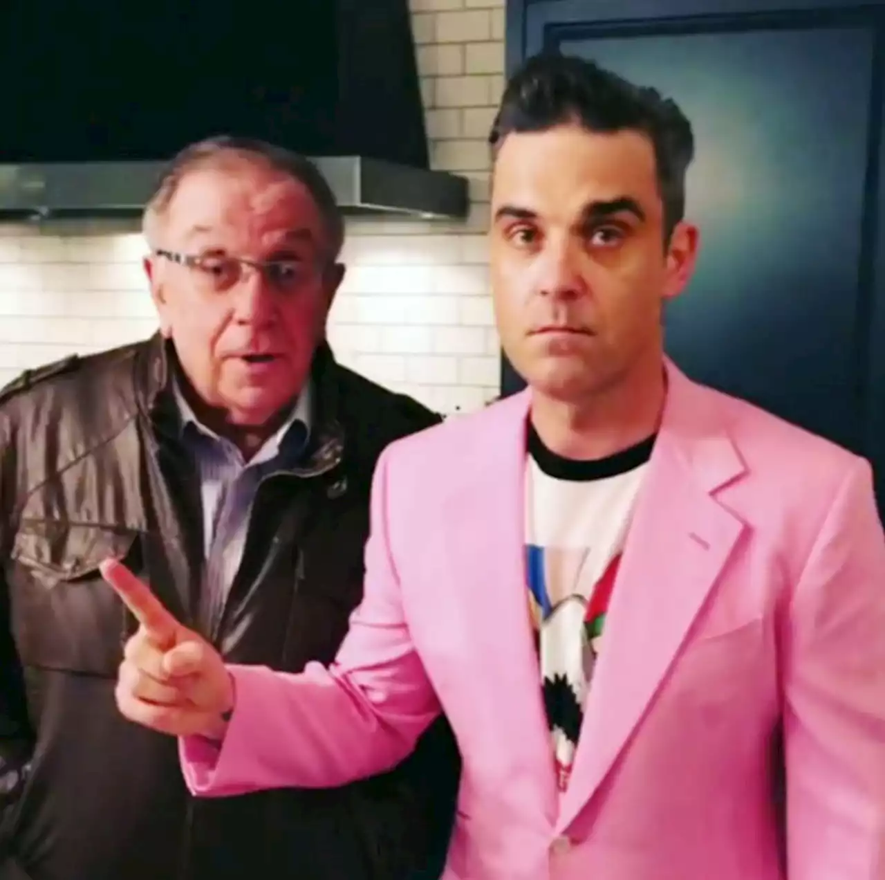 Robbie Williams' dad Pete rushed to hospital in an ambulance