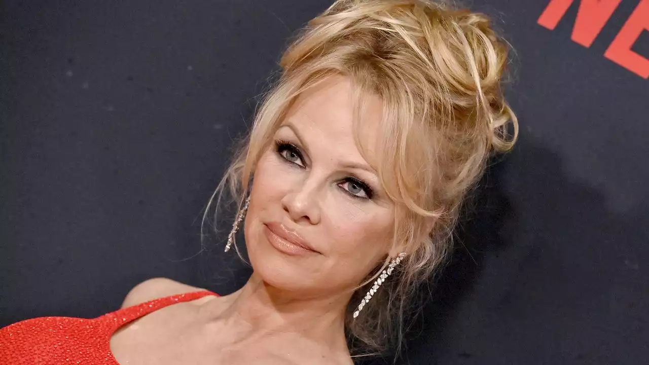 The Secret to Pamela Anderson's Prolific Updo Is a G-String