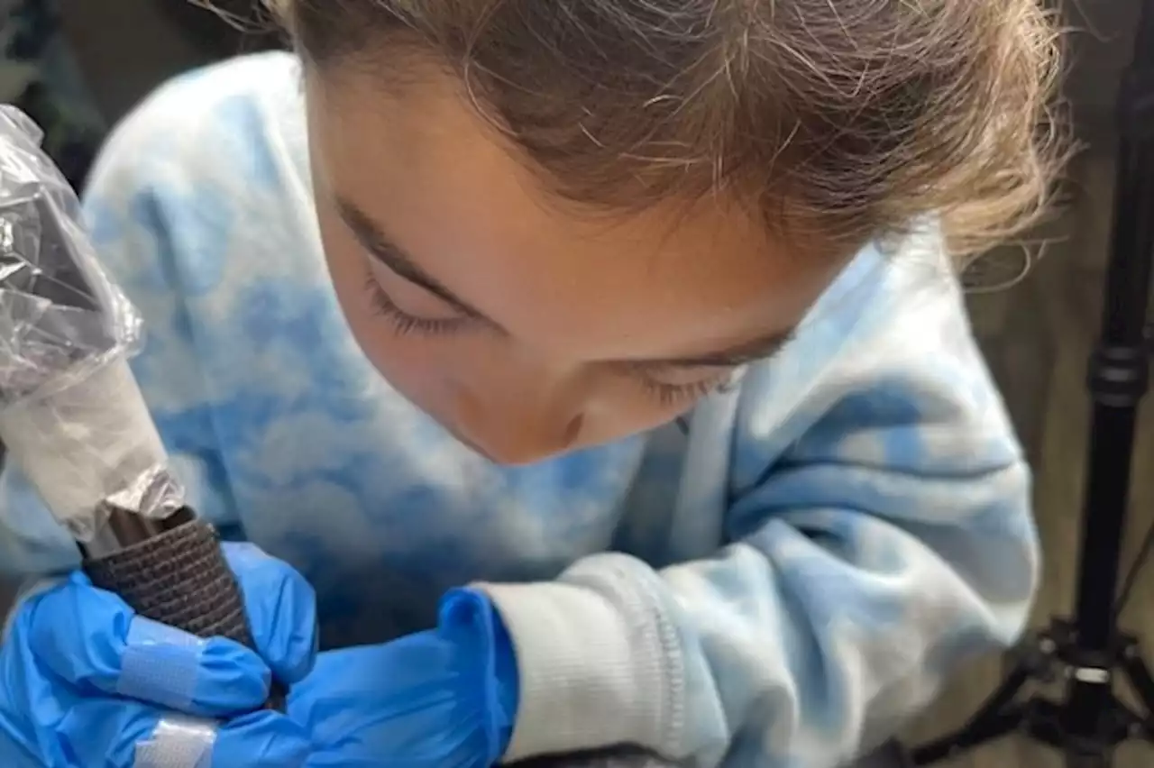 An 8-year-old girl is San Antonio's youngest tattoo artist, and she has plenty of customers