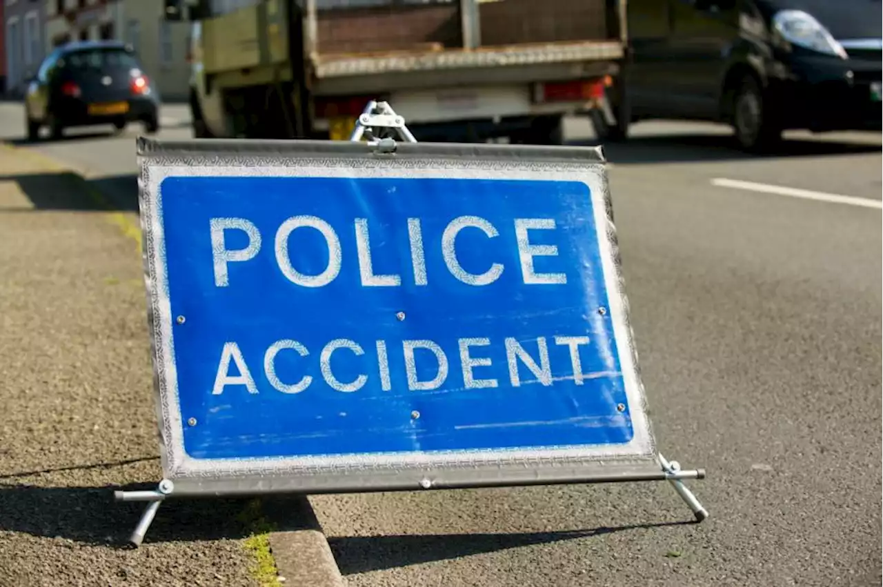 Five people taken to hospital following two-vehicle crash as road remains closed