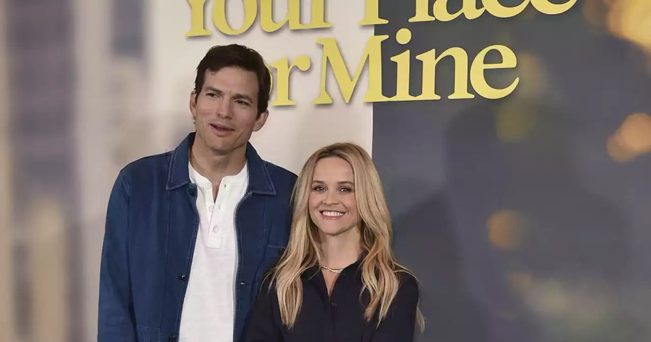 What chemistry? Ashton Kutcher explains those weird photos with Reese Witherspoon