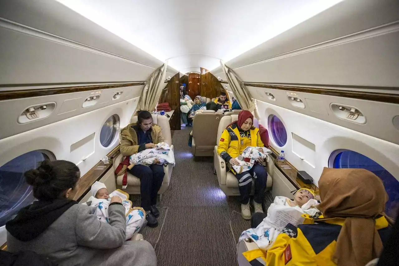 Babies found alone under the rubble in Turkey are flown to safety on the president's plane