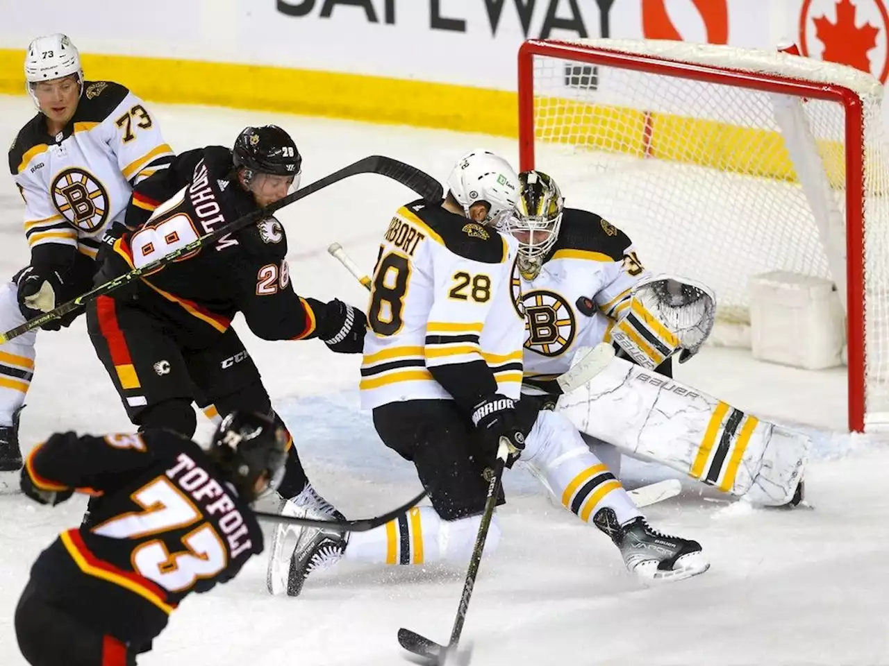 SNAPSHOTS: Flames fall in overtime despite outplaying Bruins, staging rally