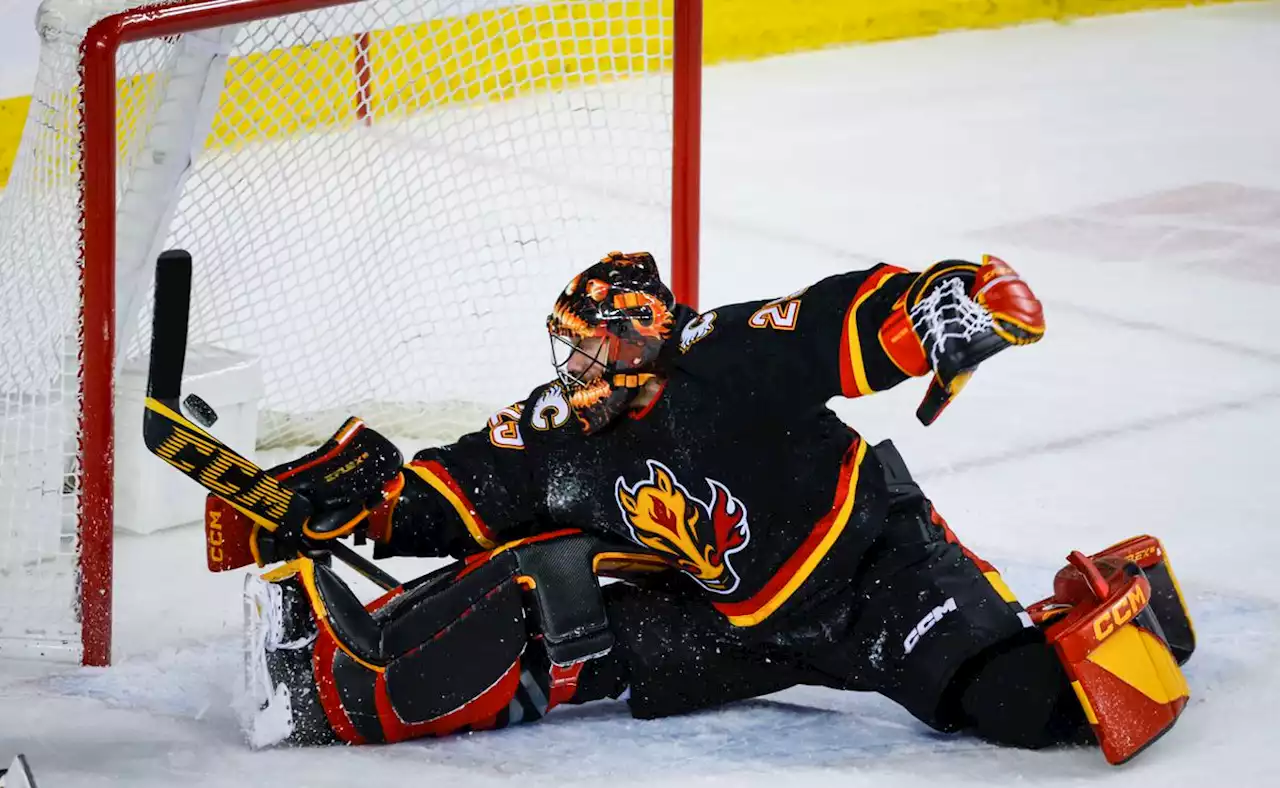 Bruins win eighth straight, Ullmark frustrates Flames with 54 saves