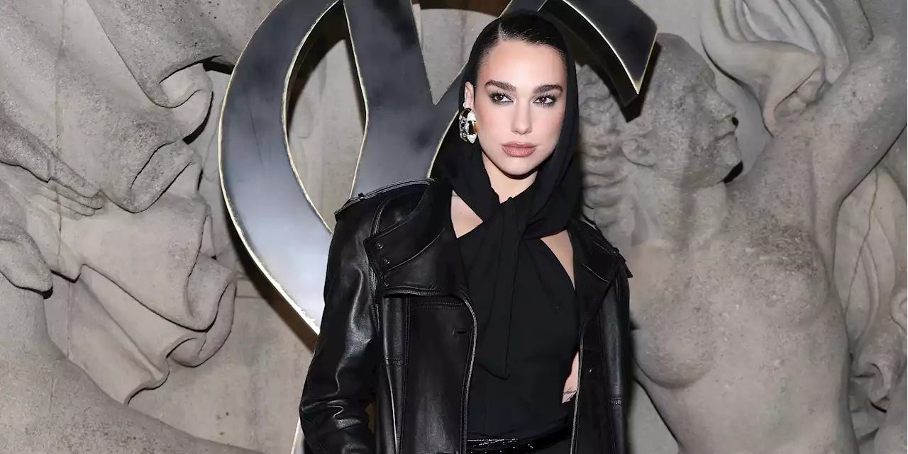 Dua Lipa Is Effortlessly Cool in a Hooded Jumpsuit and Floor-Length Leather Coat