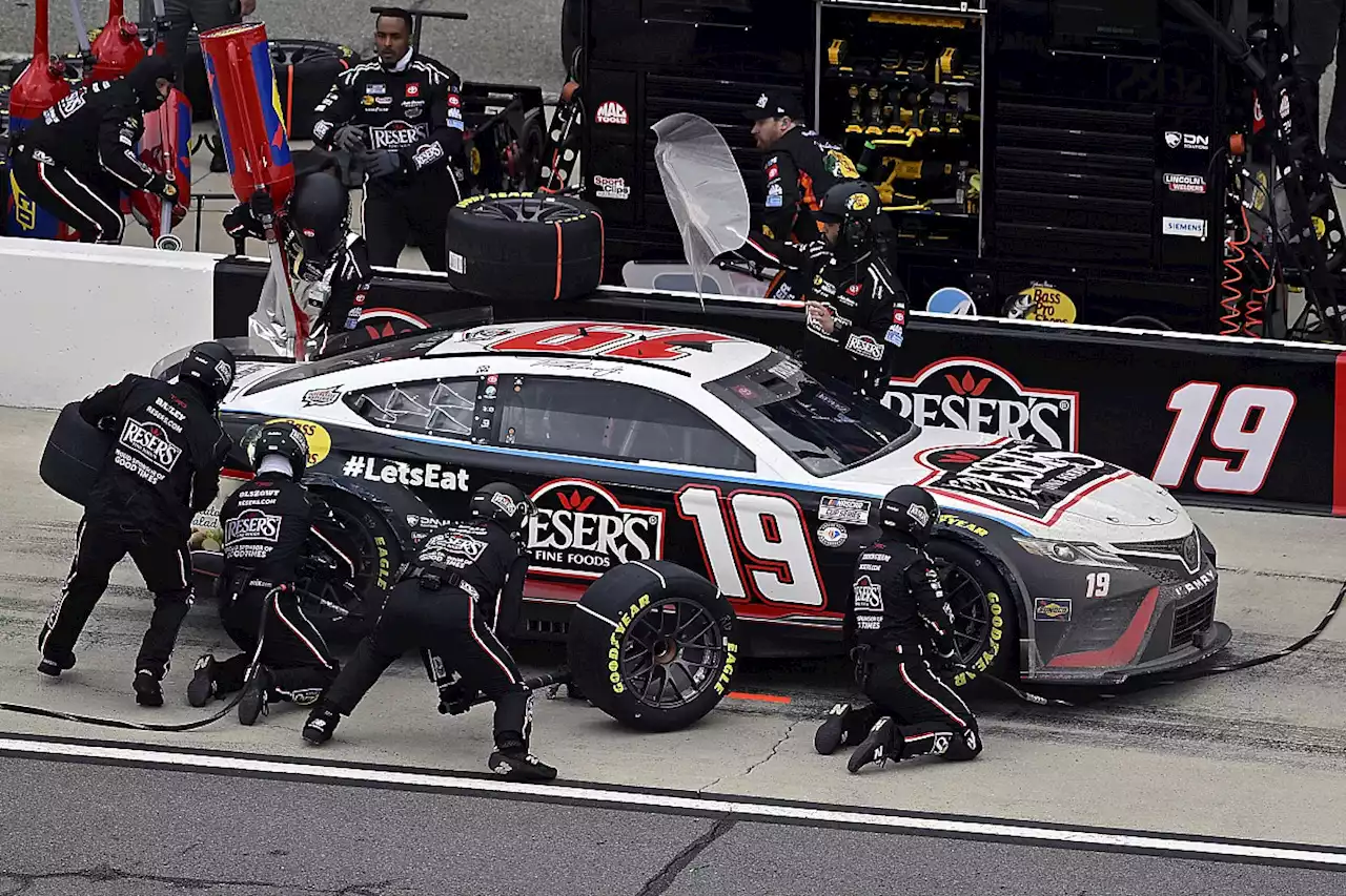 NASCAR suspends two JGR crew members after Truex loose wheel