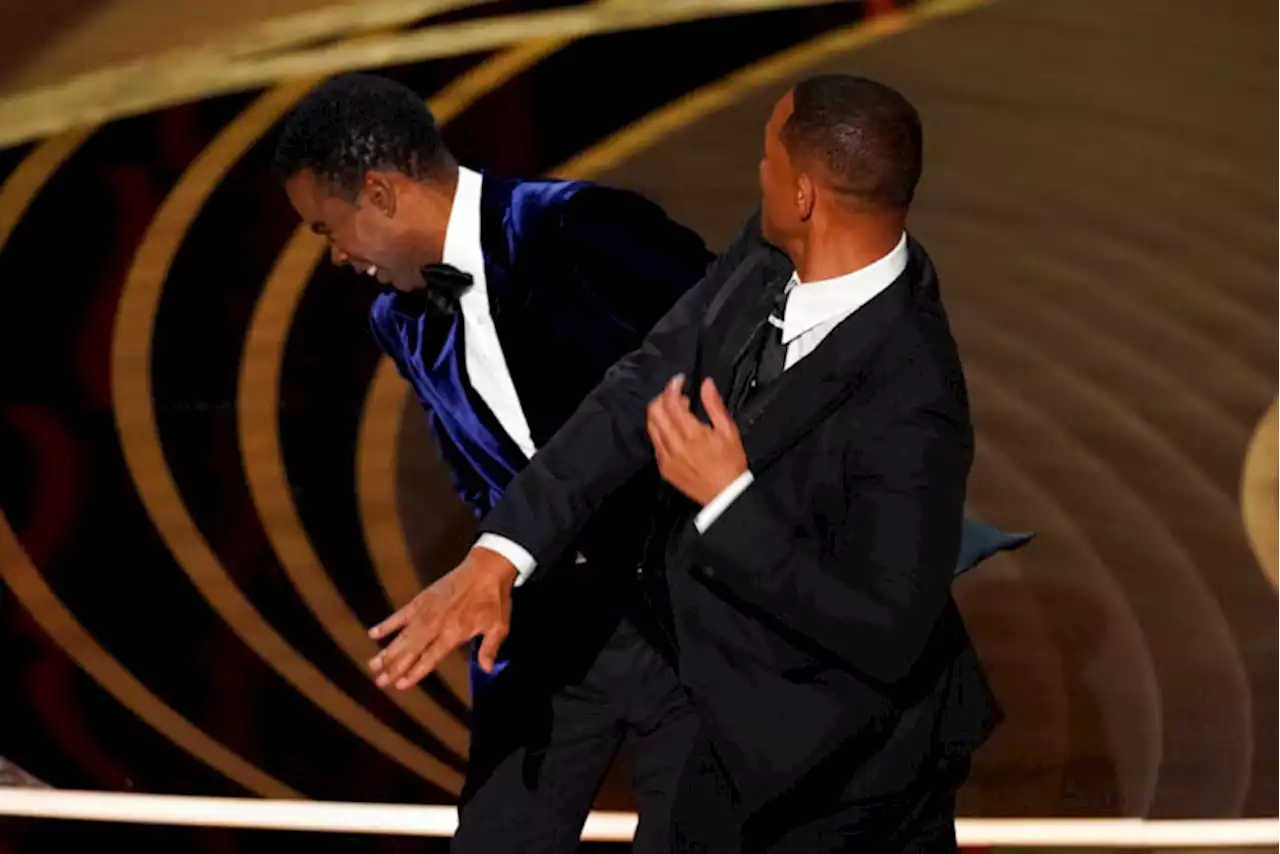 At the Oscars a year later, The Slap stays in the picture | JAKE COYLE / AP Film Writer