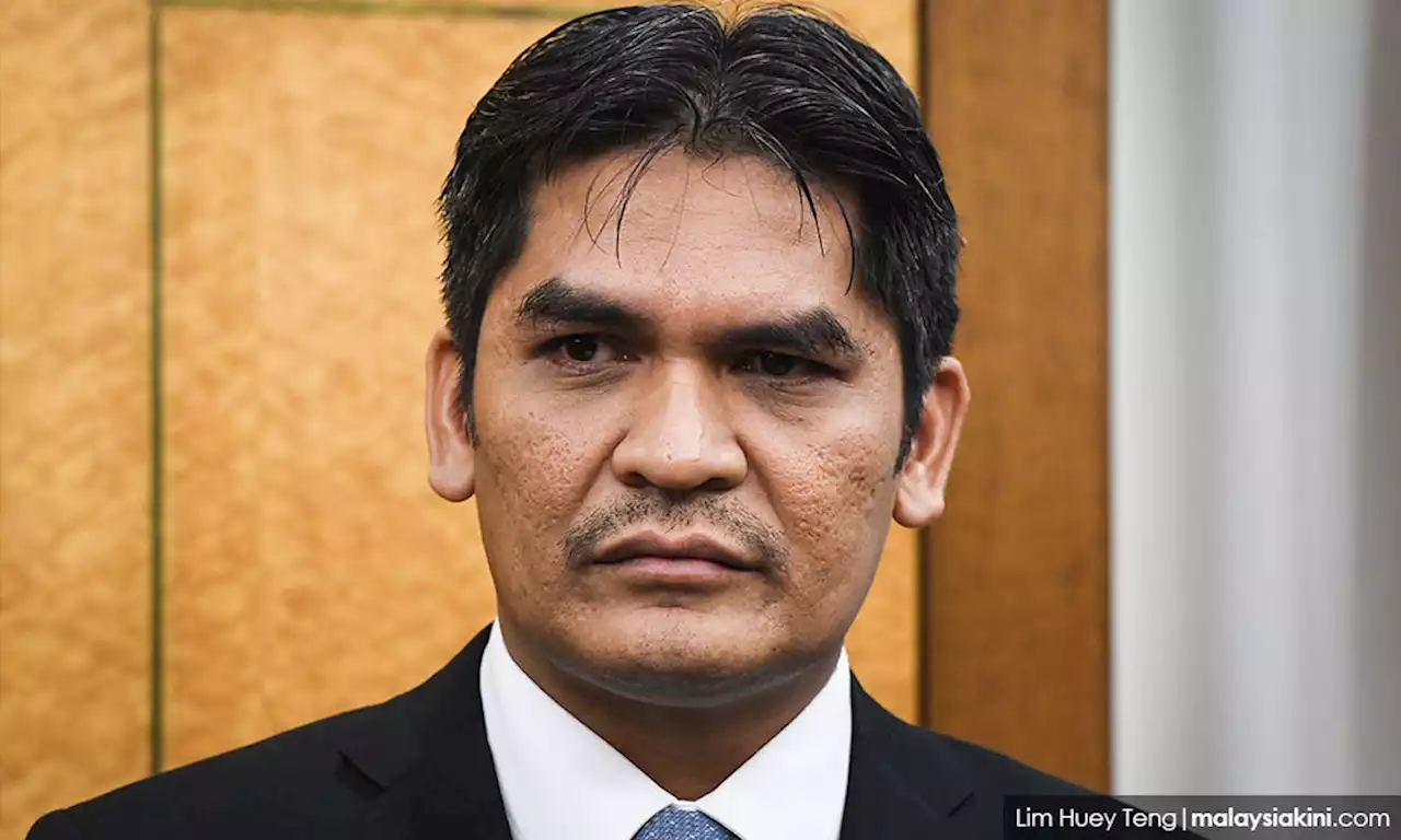 Radzi remains as Putrajaya MP, court rules