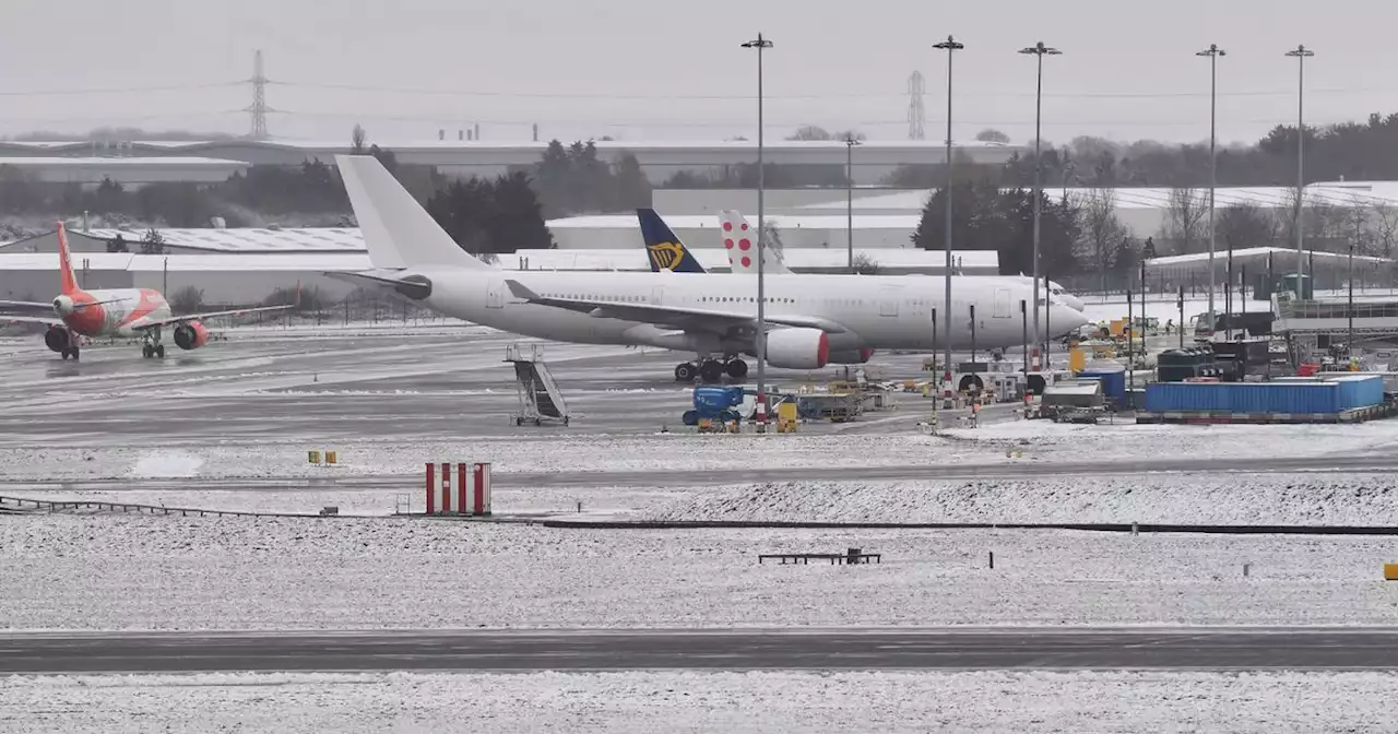 Flights delayed at UK airports as heavy snow hits the country