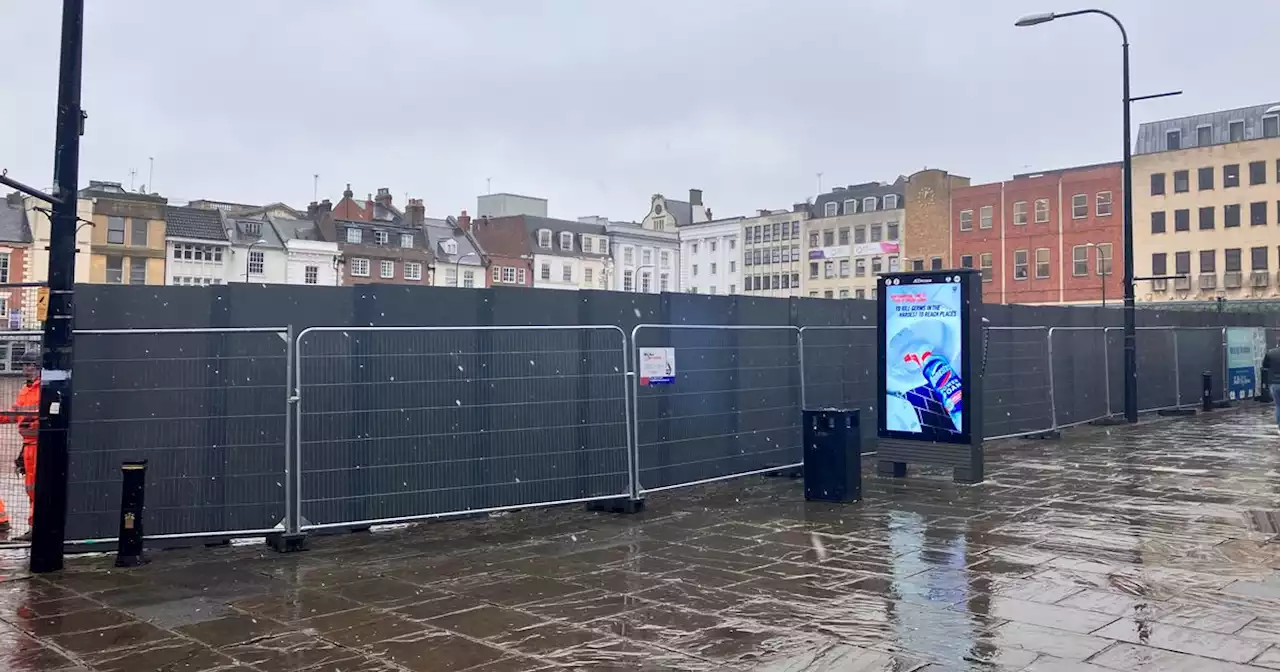 Metal wall thrown around market square for redevelopment