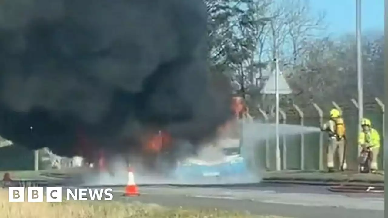 Bus engulfed by fire near Royal Marines base