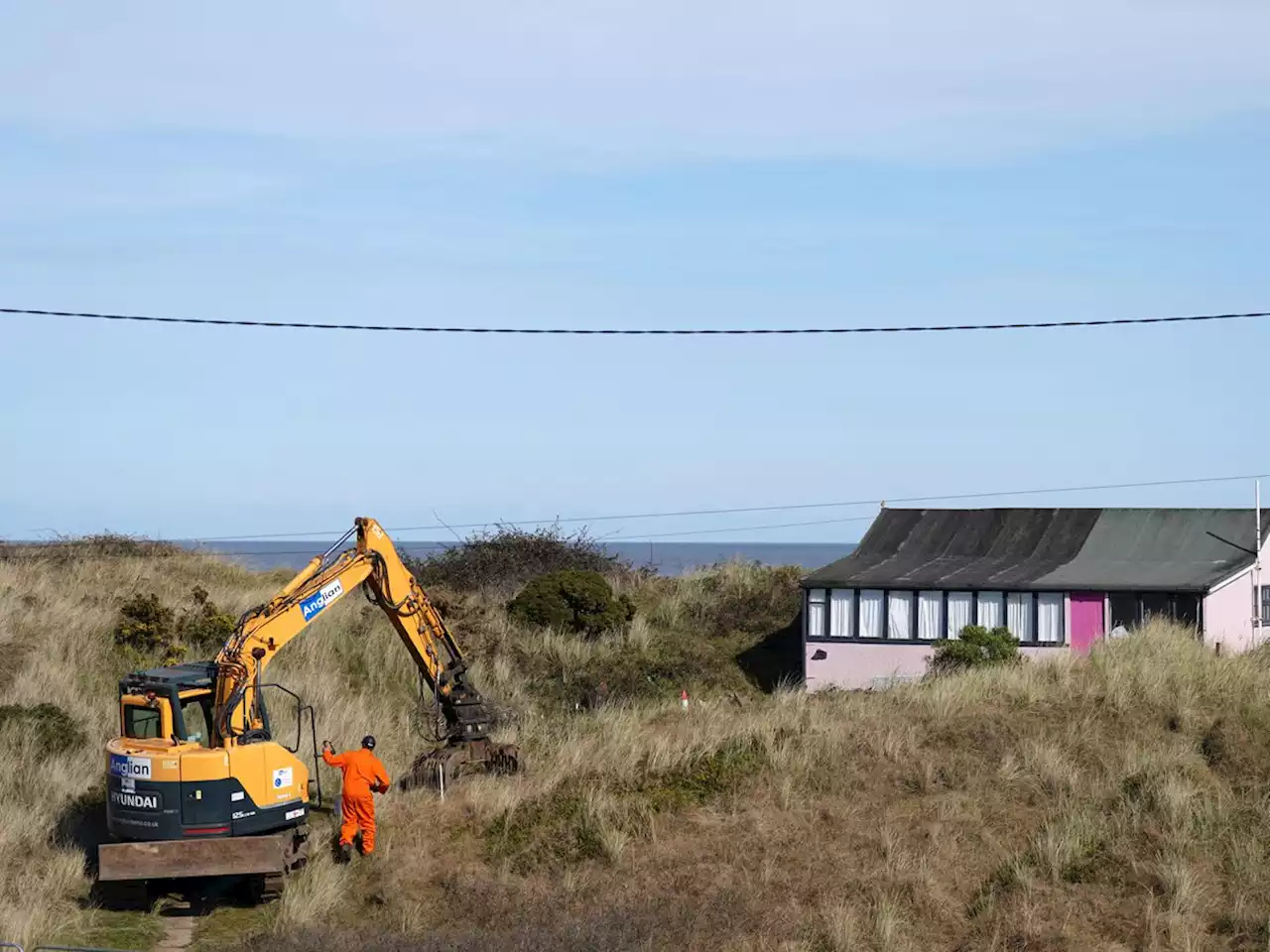 Clifftop home demolished as councillor warns of impact on local economy