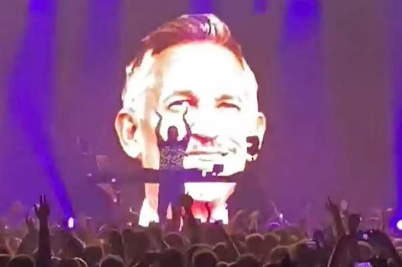 Fatboy Slim leads celebrity support for Gary Lineker with huge banner during gig