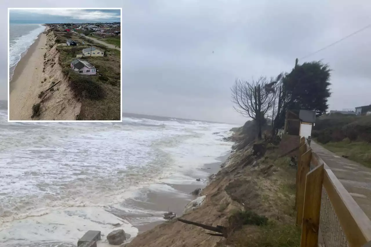 Residents flee their cliff edge homes amid fears they could plunge into sea