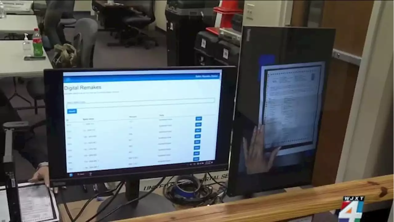 As Duval County election workers check vote-by-mail ballots with problems, new technology is helping