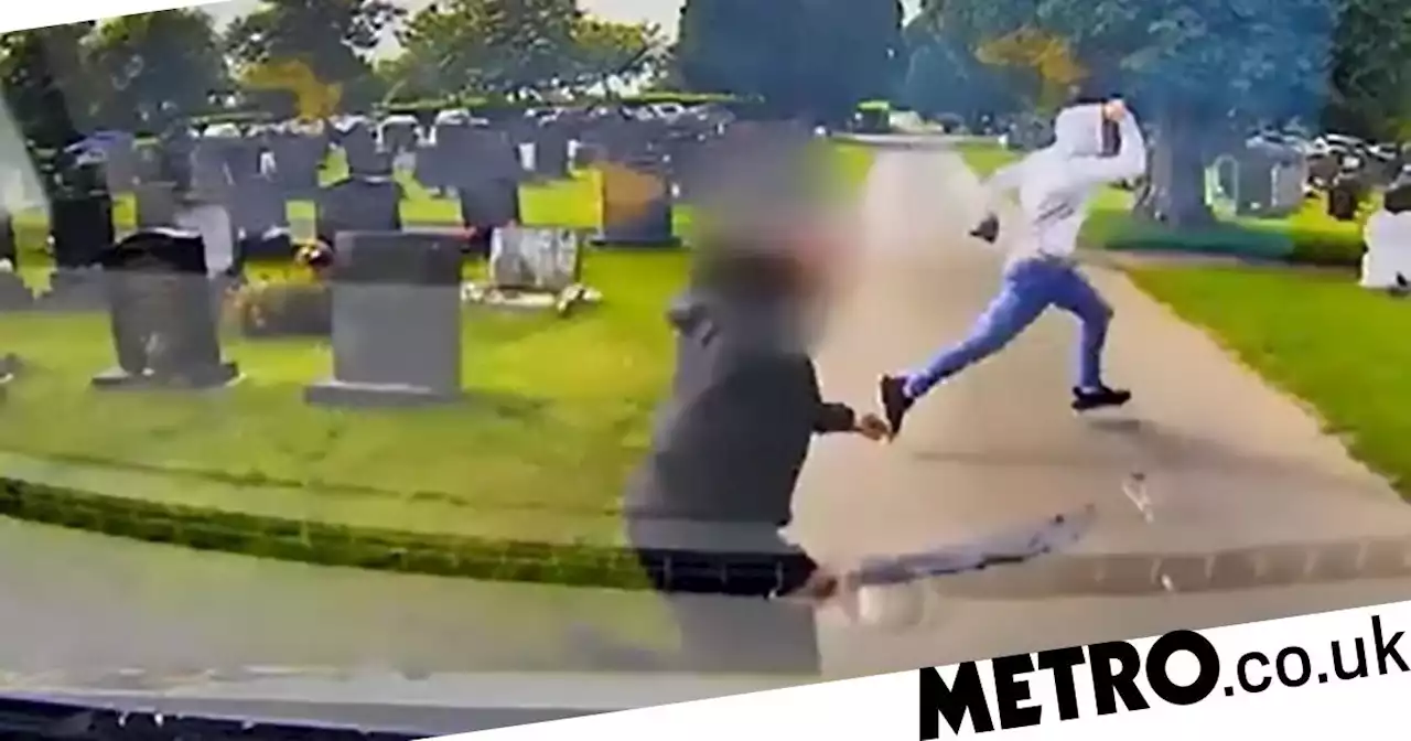 Video shows men armed with machetes and shovels fighting in cemetery at funeral